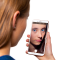 A girl looking a picture on her cell phone