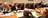 men sitting at table