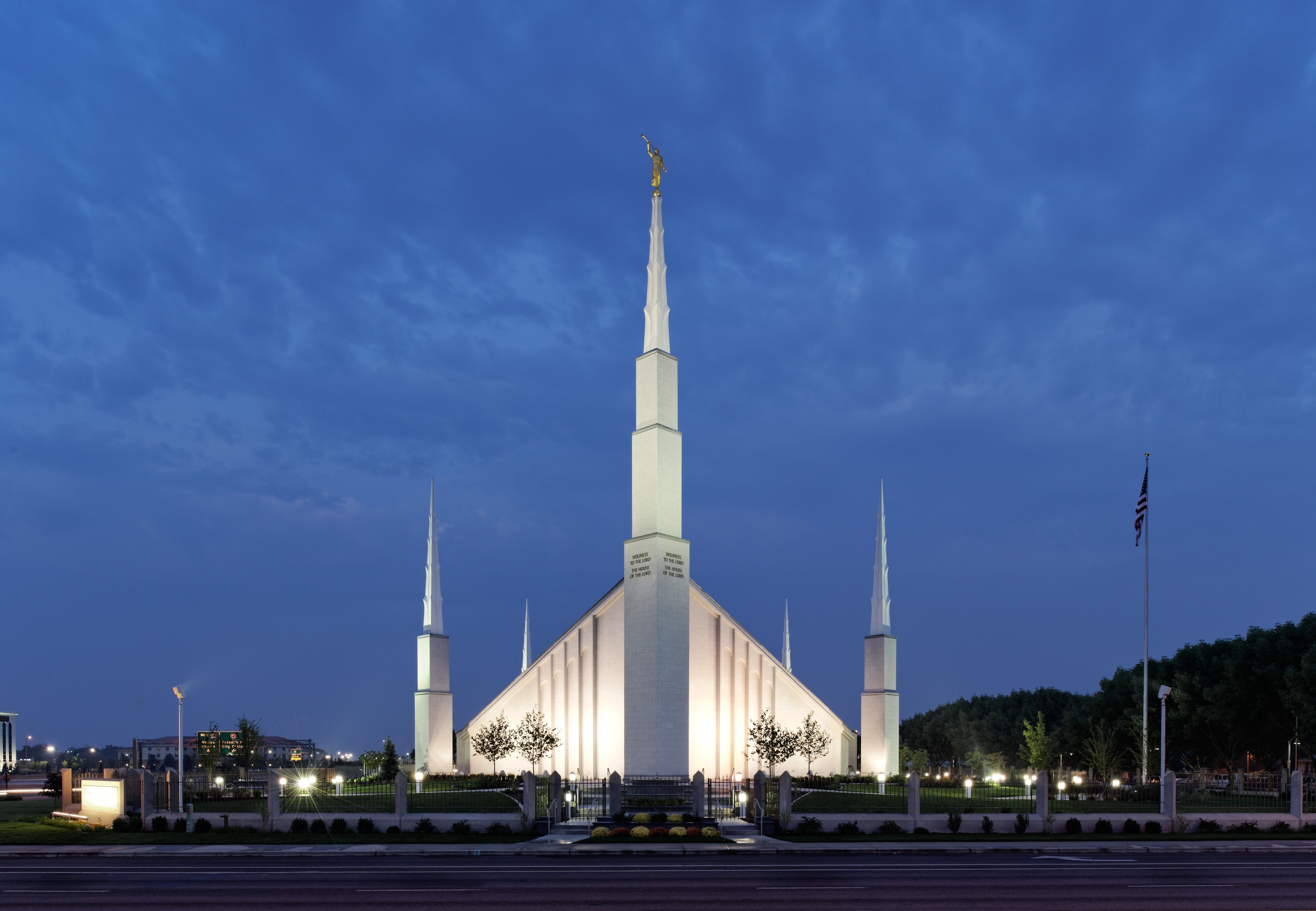 Lights brighten up the front entrance of the Boise Idaho Temple at night.