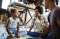 Black family sitting on the floor spending time together