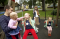 Family in playground in Latvia