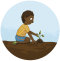 Young boy planting