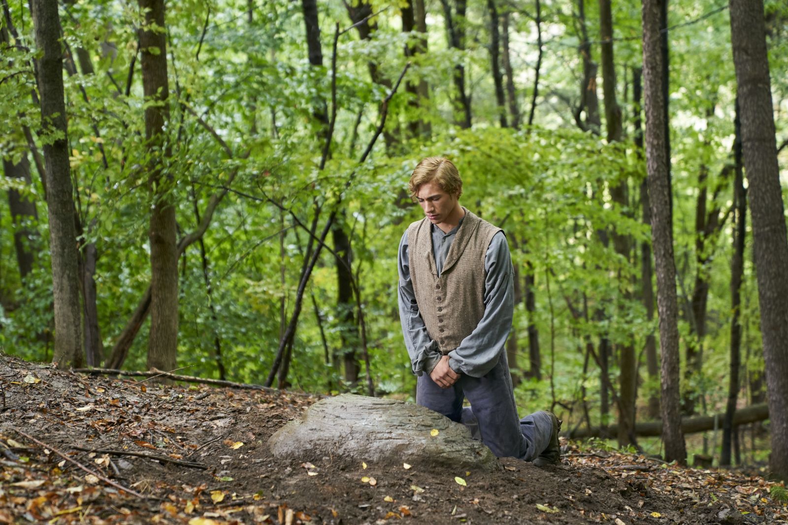 Joseph Smith Jr. Moving a Rock on the Hill Cumorah