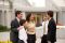 young men and women talking