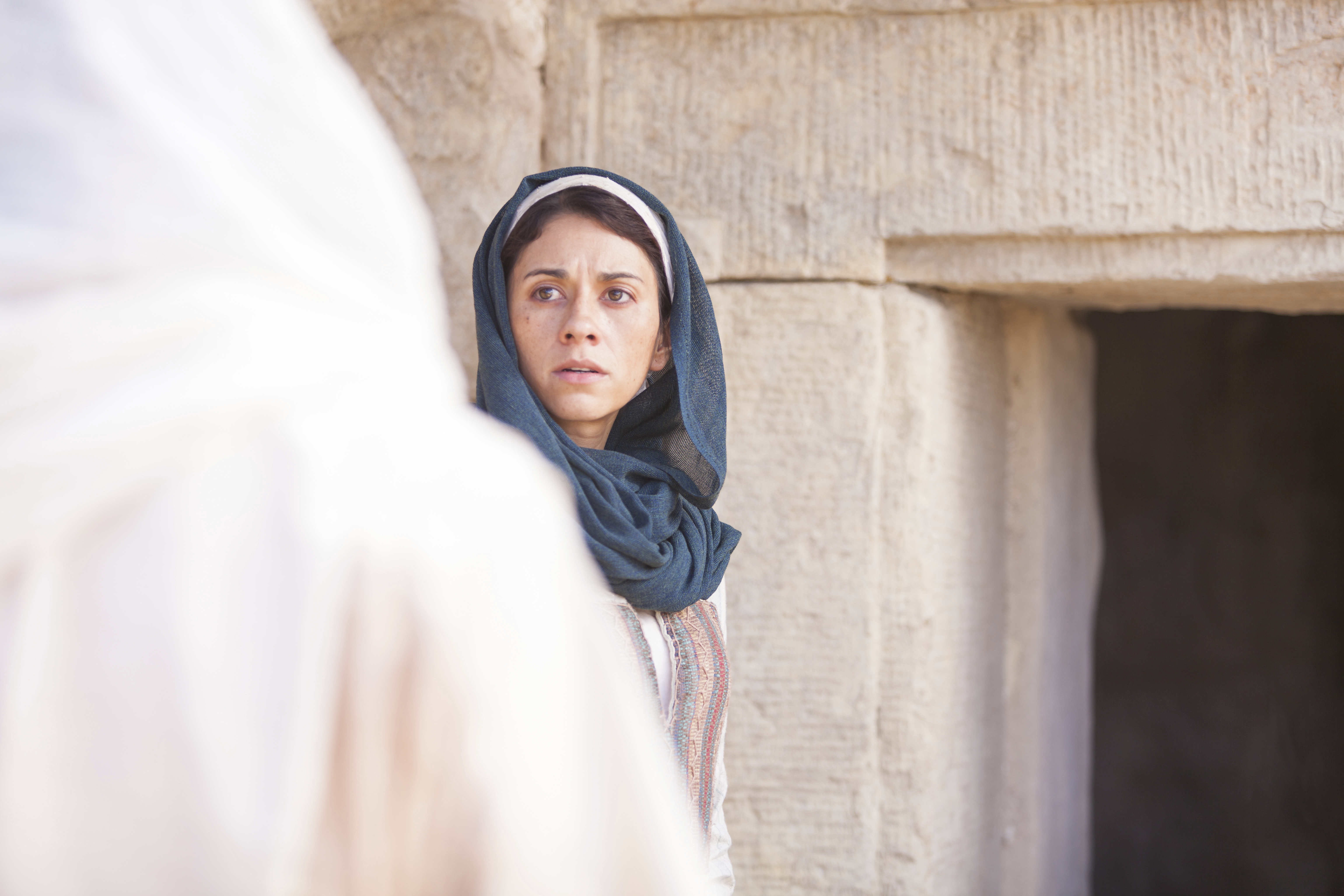 Mary Magdalene encountering the resurrected Christ at the empty tomb.