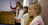 children holding pictures and singing