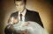 A father holding his infant daughter